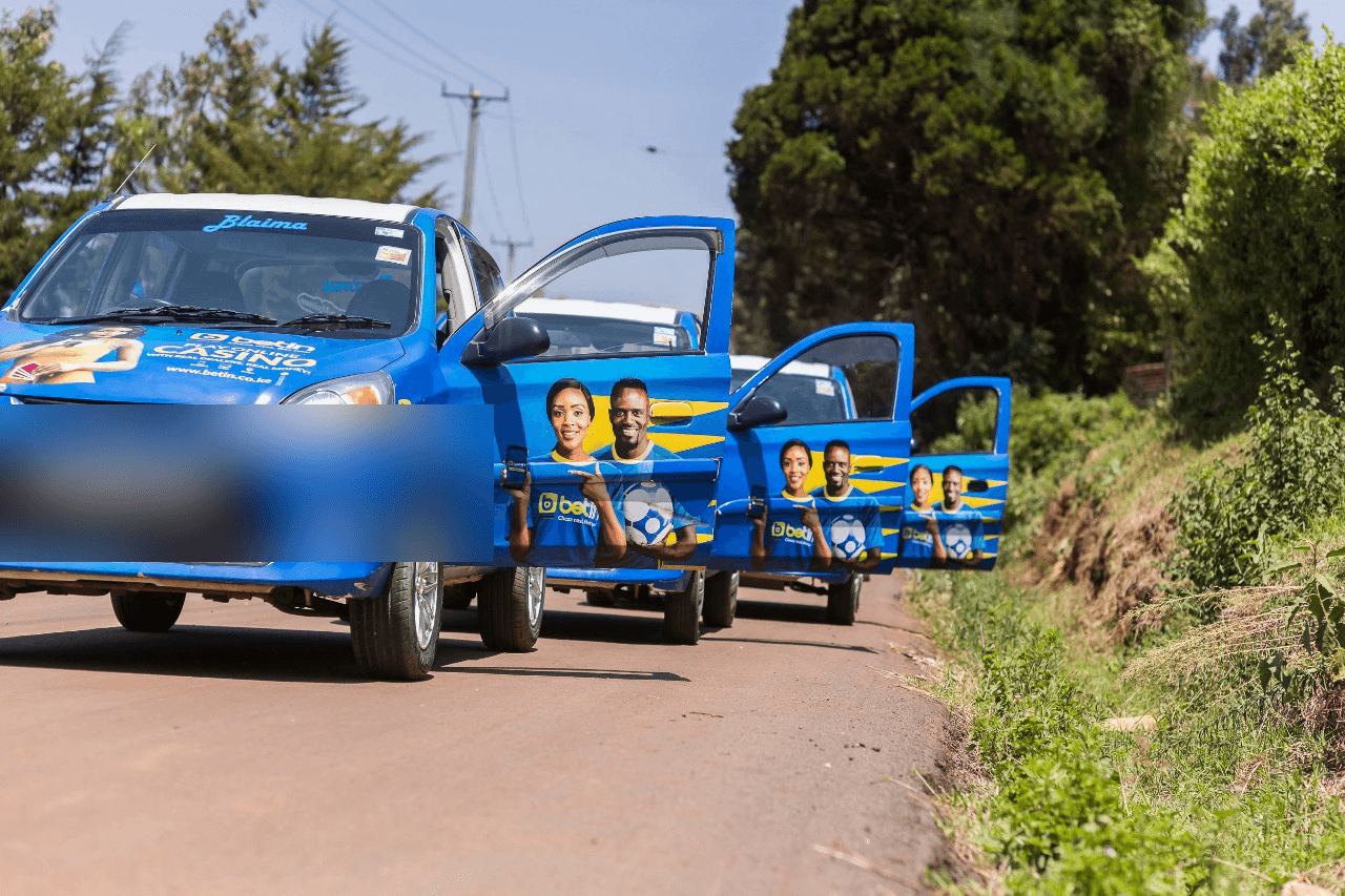 Past campaign: full-wrap sponsorship on a compact fleet, delivery photo